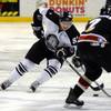 Photo: Las Vegas center Adam Miller stick handles into th Photo: Las Vegas center Adam Miller stick handles into th