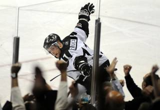 Wranglers winger Dan Riedel celebrates with the fans after scoring a third period goal against the Bakersfield Condors during game six of the Pacific Division semifinals at the Orleans Arena on Apr. 21.