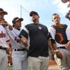 Chaparral coach Todd Faranda motivates his team between innings during the Cowboys' game against Las Vegas High Thursday at Chaparral High School.