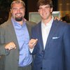 New York Giants lineman Grey Ruegamer (left) shows off his Super Bowl ring with Giants quarterback Eli Manning.