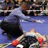 Referee Kenny Bayless checks on British boxer Ricky Hatton after he was knocked out by Manny Pacquiao, of the Philippines, in the second round of their junior welterweight title boxing match Saturday, May 2, 2009, at the MGM Grand in Las Vegas. Referee Kenny Bayless checks on British boxer Ricky Hatton after he was knocked out by Manny Pacquiao, of the Philippines, in the second round of their junior welterweight title boxing match Saturday, May 2, 2009, at the MGM Grand in Las Vegas.