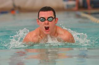 Boulder City senior Jeremy Smith practices the breaststroke in May during a team practice at the Boulder City Pool.