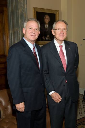 Sen. Harry Reid with Rob Dorinson, president of Evergreen Recycling. 