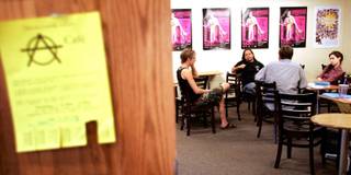 Local anarchists gather at the Coffee Bean & Tea Leaf for an A-Cafe meeting Thursday, May 28, 2009. From left is Edward Anauo, Kelly Patterson, Charles Johnson (back to camera) and Rachel Bovard. 