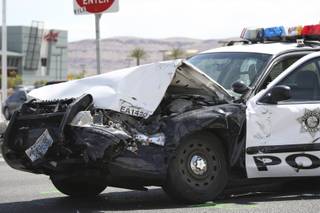 A Metro Police cruiser was involved in an accident with a Lexus sedan while responding to a robbery call Saturday on West Flamingo Road near the 215 Beltway. Two police officers and the driver of the Lexus were taken to University Medical Center with minor injuries.