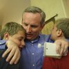 Cam Walker receives a hug from his twin sons, Nicholas and Marcus, right, after winning the seat on the Boulder City Council in the general election Tuesday. Walker had a watch party at Kirk and Vivian Harrison's home. Cam Walker receives a hug from his twin sons, Nicholas and Marcus, right, after winning the seat on the Boulder City Council in the general election Tuesday. Walker had a watch party at Kirk and Vivian Harrison's home.