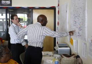 2:07 p.m.  - William Robinson, right, candidate for North Las Vegas Mayor, looks over district maps with campaign manager Jim Ferrence at the Robinson campaign headquarters in North Las Vegas Tuesday June 2, 2009. Ferrence had three races going on election day. He represented Robinson, Steve Kirk for Henderson Mayor, and Kathleen Boutin for Henderson City Council.