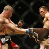 Photo: Rich Franklin, right, lands a kick in his UFC 99 f Photo: Rich Franklin, right, lands a kick in his UFC 99 f