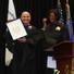 Tennis legend Andre Agassi holds up a letter from President Obama to the first graduating class of Agassi's College Prepatory Academy. Tennis legend Andre Agassi holds up a letter from President Obama to the first graduating class of Agassi's College Prepatory Academy.