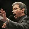 Photo: Ring announcer Bruce Buffer calls the start of a f Photo: Ring announcer Bruce Buffer calls the start of a f