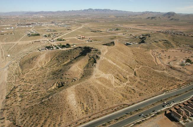 Trails were being built up a hillside in 2005, as Exploration Peak Park took shape in the Mountain's Edge community. 
