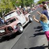 Children wave to an old pickup truck designed after the Pixar character "Mater" from the animated movie "Cars," during the 15th annual Summerlin Council Patriotic Parade on Saturday. Children wave to an old pickup truck designed after the Pixar character "Mater" from the animated movie "Cars," during the 15th annual Summerlin Council Patriotic Parade on Saturday.