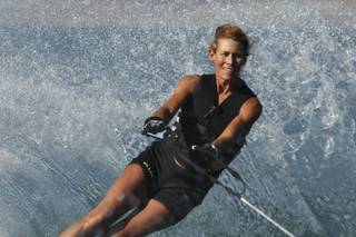 Lori Dunsmore, 51, kicks up some spray while training Monday at Lake Mead for the 16th Water Ski Racing World Championships July 18-25 in Antwerp, Belgium. The event marks Dunsmores 23rd year competing as a member of the U.S. Elite Water Ski Racing Team.
