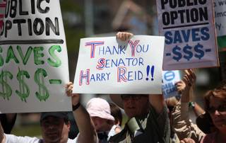 Advocates rally outside the Lloyd George Federal Building on Thursday. The group delivered petitions in support of its position on public health care options to the offices of Sens. Harry Reid (D-Nev.) and John Ensign (R-Nev.)