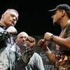 Photo: Brock Lesnar, left, and Frank Mir square off at a Photo: Brock Lesnar, left, and Frank Mir square off at a
