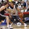 Golden State guard Stephen Curry works against Houston's Brad Newley during his pro debut on Friday afternoon at the COX Pavilion. Curry scored 16 points on just 4-of-14 shooting, but showed a professional demeanor which can be attributed to growing up around NBA locker rooms.