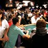 Massage therapist Alana Madsen gives player John Juanda a massage during the World Series of Poker Main Event at the Rio.