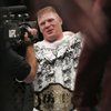 Brock Lesnar smiles after defeating Frank Mir in their heavyweight title fight at UFC 100. Lesnar won with stoppage in the second round.