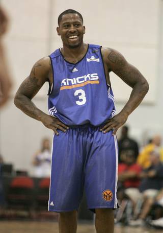 Former UNLV standout Wink Adams handles the ball as a member of the New York Knicks during the NBA's Summer League Wednesday, July 15, 2009. 