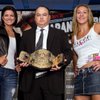 Photo: Strikeforce chief Scott Coker, center, holds the 1 Photo: Strikeforce chief Scott Coker, center, holds the 1