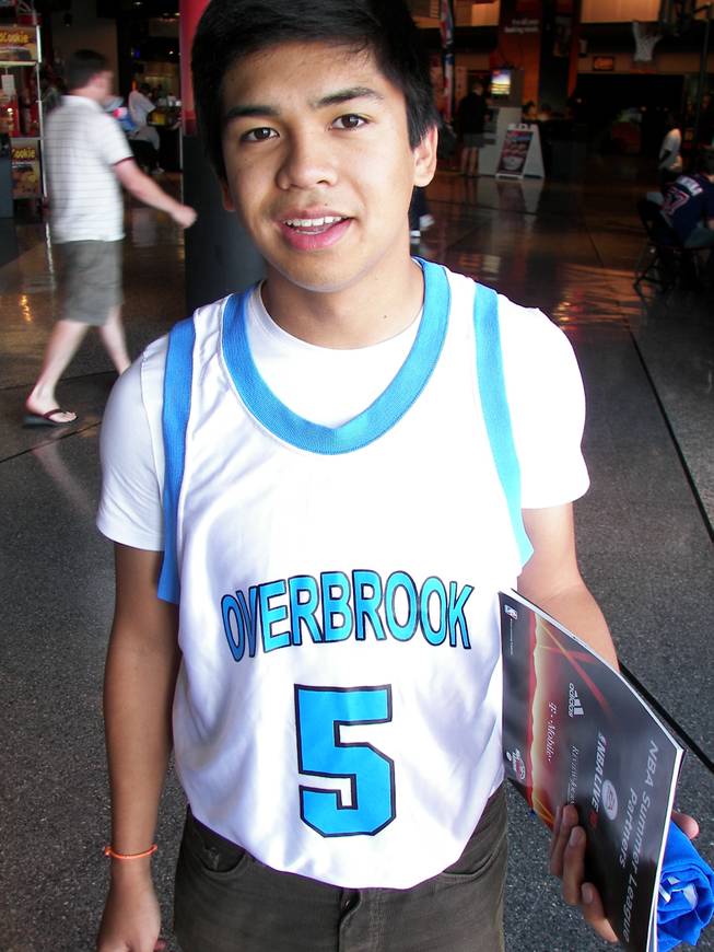 The hands-down winner of our informal and unofficial week-long jersey contest at the NBA Summer League. Coronado High graduate Jules Cruz, 17, wears Wilt Chamberlain's replica jersey from Overbrook High. 