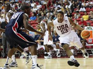 Derrick Rose drives it during the USA Basketball Showcase game Saturday at the Thomas & Mack Center.

