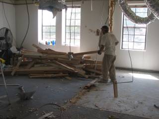 Worker Joe Teluca clears materials from Boulder City Police Chief Thomas Finn's former office during demolition. The space is being converted into offices for Finn and Deputy Chief John Chase and a conference room.