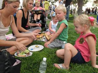 Denille Ingalls and Kristin Kirch make a play date out of National Night Out as they combined family time with community time at The Lakes community.