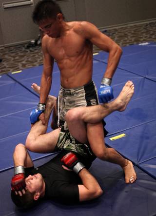 Miguel Angel Torres, WEC Bantamweight Champion, workouts for the media Thursday at the Hardrock Hotel and Casino.