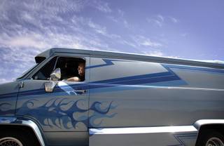 Paul Tunnecliff of Pahrump sits inside his 1975 Chevrolet van Tuesday, July 28, 2009.  He has renovated it several times since he bought it new and is trying to start a van club. 