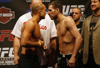 The Ultimate Fighting Championship weigh in at the Wachovia Center in South Philadelphia fon Friday afternoon August 7, 2009. The fight will take place on Saturday evening August 8, 2009. At left is UFC Lightweight Champion BJ Penn facing off with opponent Kenny Florian after weigh in on Friday afternoon at the Wachovia Center.