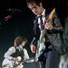 Brendon Urie, with new Panic! At the Disco guitarist Ian Crawford in the background.