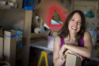 Artist Danielle Kelley poses in her garage studio on Wednesday, Aug. 5, 2009 in Las Vegas. 