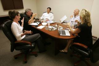 Greg Lee, center, takes part in an advertising meeting with, from left, director of marketing Alysha Rossell, general manager Frank Toddre, COO Andre Carrier and publisher Darcie Hansen at the Eureka casino in Mesquite.