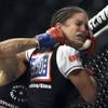 Photo: Gina Carano, right, is punched by Cris Photo: Gina Carano, right, is punched by Cris