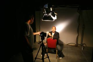 Chris Kisner poses for an NBC photographer while waiting to find out if he will get to be a contestant on the network's new game show, 