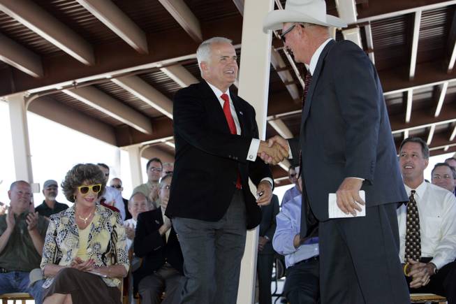 Nevada Governor Jim Gibbons, left, is introduced by Clark County ...