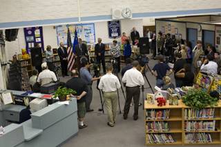 U.S. Education Secretary Arne Duncan holds a press conference with Sen. Harry Reid and Congresswoman Dina Titus at Harley Harmon Elementary School in Las Vegas on Wednesday, Aug. 26, 2009. 