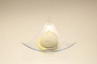 Bryan's elimination challenge-winning dish, a sweet and sour lime macaroon with guacamole and corn pudding.