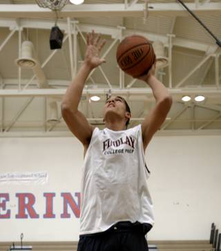 Nick Johnson of Findlay Prep runs drills during practice Tuesday at the Henderson International School.