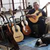 Photo: Classical guitarist Ricardo Cobo plays at his home