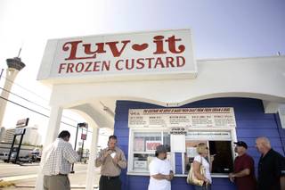 Customers, a mix of tourists and locals, crowd the window at Luv-It Frozen Custard in downtown Las Vegas Tuesday, Sept. 15, 2009. 