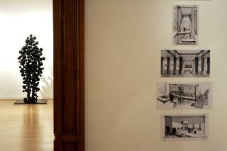 Drawings of the Harmon Hotel by Foster + Partners, right, and Antony Gormley's 