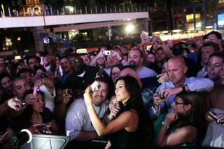 
Celebrity famous person Kim Kardashian poses for photos with fans during the red carpet event for the opening Friday of Pink's Hot Dogs at Planet Hollywood. Other D-listers at the (media) event were Holly Madison and Mel B, current and past stars of the venue's 