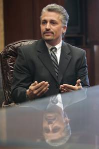Steven Brox speaks Sept. 17 about the raid by Metro intelligence detectives of his company, United States Justice Associates.
