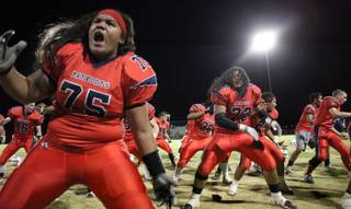 Liberty celebrates a 34-14 home win against Green Valley.