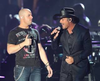 Chris Daughtry and Tim McGraw perform during the Andre Agassi Foundation for Education's Grand Slam for Children benefit concert at Wynn Las Vegas Sept. 26, 2009.