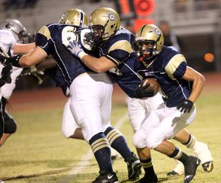 Cheyenne's Jordan Butler looks for running room Friday night against Palo Verde.
