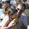After waiting in a long line for a favorite treat, Camile Thevenut digs into an ear of grilled corn with her dad, Roy, during the annual Art in the Park event in Boulder City. After waiting in a long line for a favorite treat, Camile Thevenut digs into an ear of grilled corn with her dad, Roy, during the annual Art in the Park event in Boulder City.