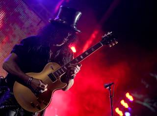 Slash performs during the Slash & Friends concert at Bare Pool Lounge at The Mirage on Friday night.